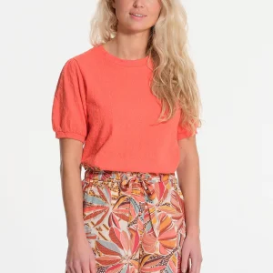 T-shirt corail avec des étoiles et manches amples