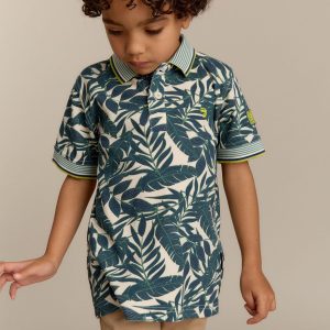 Polo garçon blanc avec motif végétal